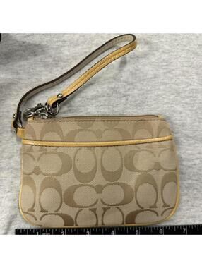 Y2k vintage Tan and yellow Coach wristlet with zipper closure and leather trim